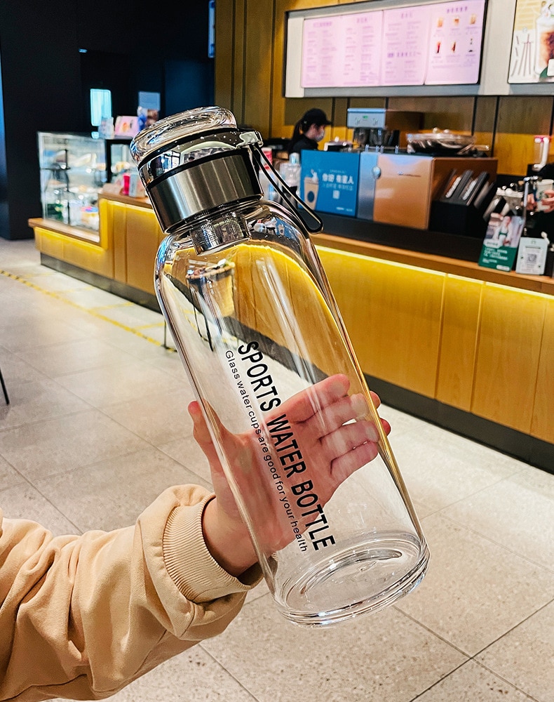 2L Transparent Portable Water Bottle for Outdoor Activities Ideal for Milk, Juice, Tea, and More
