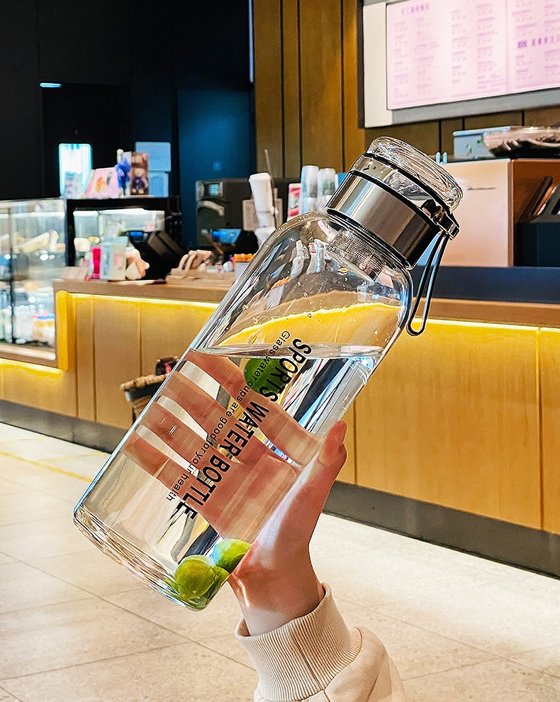 2L Transparent Portable Water Bottle for Outdoor Activities Ideal for Milk, Juice, Tea, and More